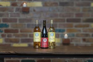 Mixed wine selection of red and white wines from the Silver Brick Club at Red Brick Winery, inspired by Napa Valley.