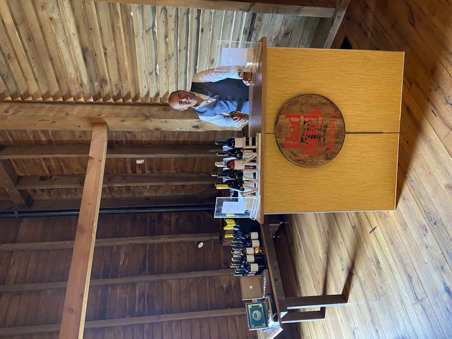 Winemaker Ahmed Chraga leading a wine tasting session at Red Brick Winery in Napa Valley